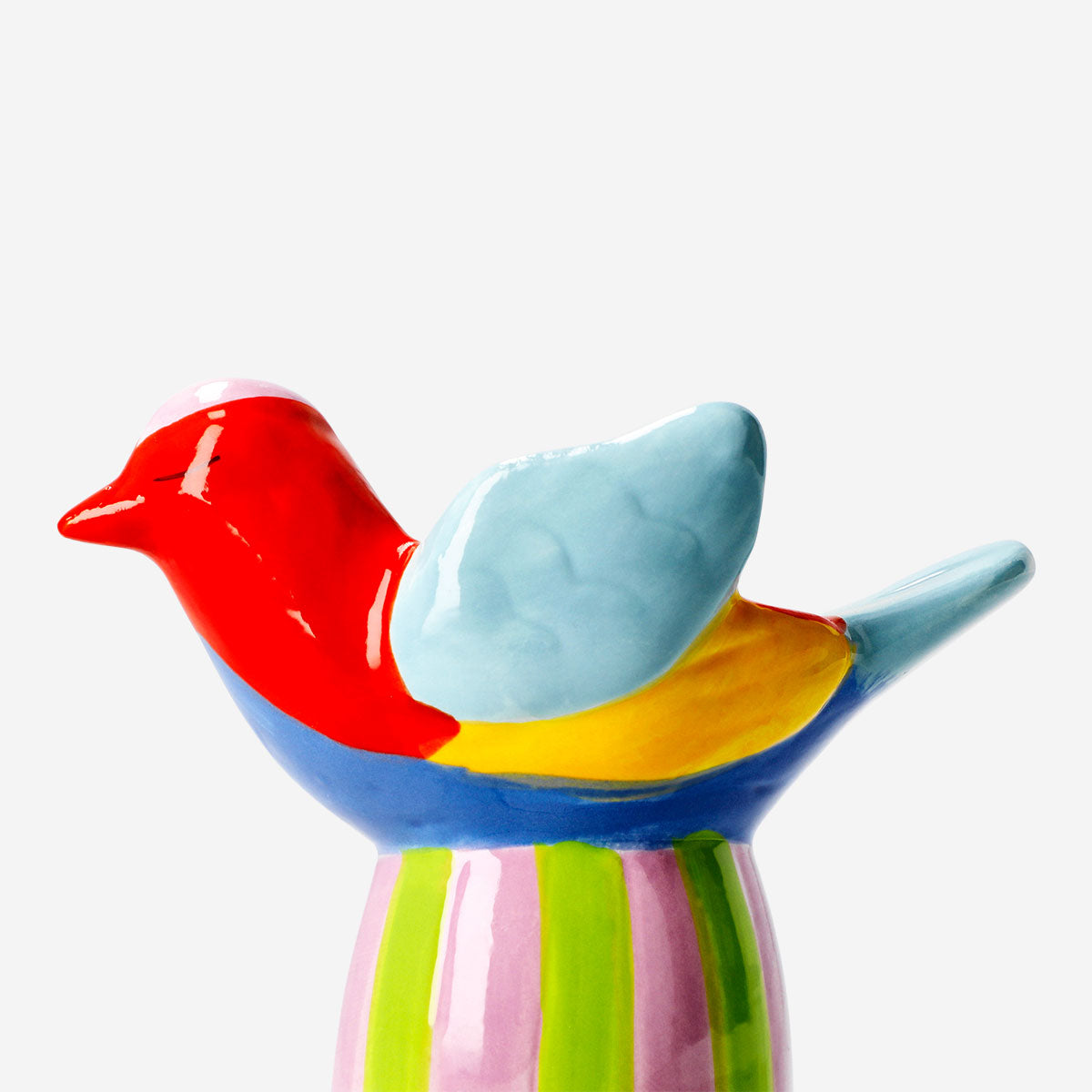 Ceramic bird tealight holder with striped base, decorative home decor piece by Flying Tiger Copenhagen.