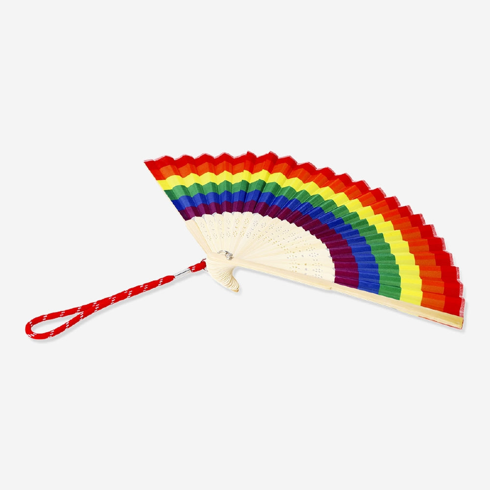 Foldable bamboo fan with rainbow print textile design by Flying Tiger Copenhagen, showcasing vibrant colors and lightweight portable style.