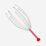 Flying Tiger Copenhagen striped head massager gadget with diamond detail, designed for scalp relaxation and stress relief.