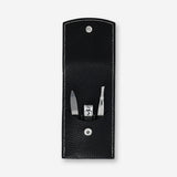 Black manicure and pedicure set in a compact pouch from Flying Tiger Copenhagen, with nail tools and personal care accessories.