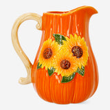 Ceramic kitchen jug with embossed sunflower design, 1.12L capacity, by Flying Tiger Copenhagen, featuring a white background and sunflowers.