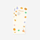 Office shopping list with magnet from Flying Tiger Copenhagen showing a colorful, organized list on a magnetic pad for easy sticking.