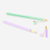 Two Flying Tiger Copenhagen ballpoint pens with decorative charms, ideal for office use, featuring colorful designs and smooth ink flow.