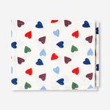 Heart-patterned home tablecloth by Flying Tiger Copenhagen, 140x220 cm, featuring a charming design for festive or everyday use.