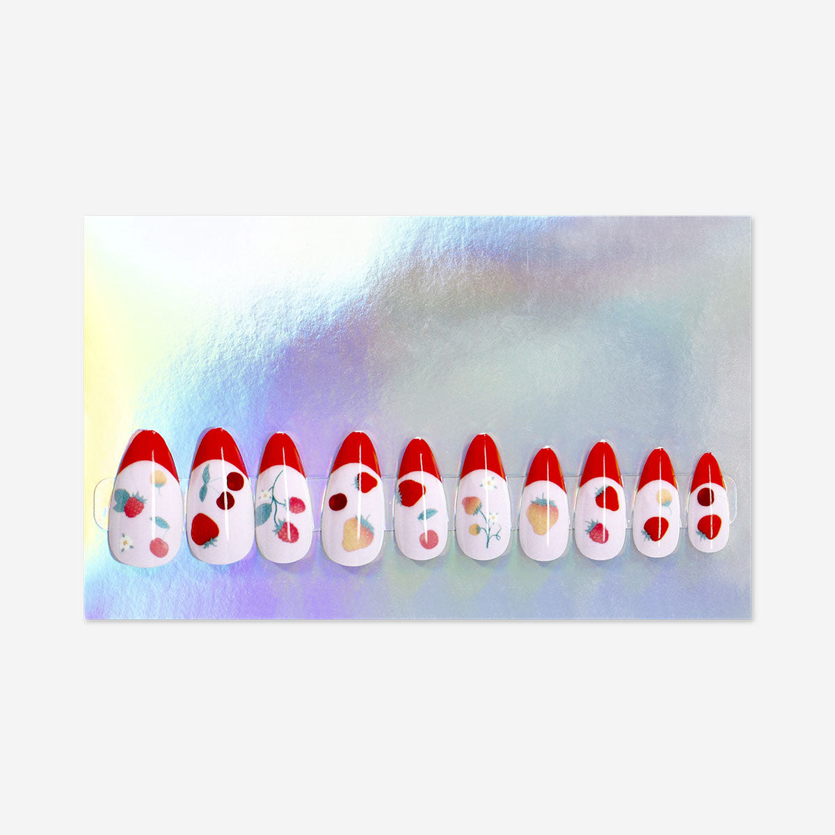 Flying Tiger Copenhagen strawberry design press-on nails with colorful, fruity decoration for personal care and stylish nail looks.