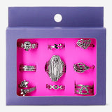 Set of nine adjustable Gothic textile rings with intricate designs from Flying Tiger Copenhagen, displayed on a neutral background.
