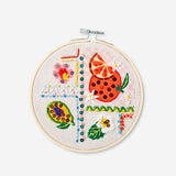 Embroidery kit with tropical print from Flying Tiger Copenhagen, including colorful threads and fabric for creative hobby projects.