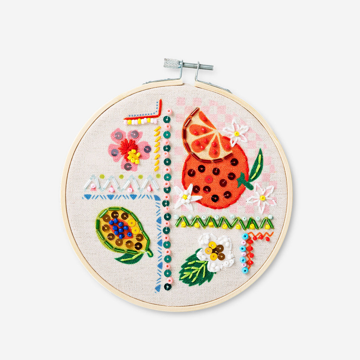 Embroidery kit with tropical print from Flying Tiger Copenhagen, including colorful threads and fabric for creative hobby projects.