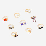 Set of nine adjustable children's Halloween-themed textile rings with fun, colorful designs by Flying Tiger Copenhagen.