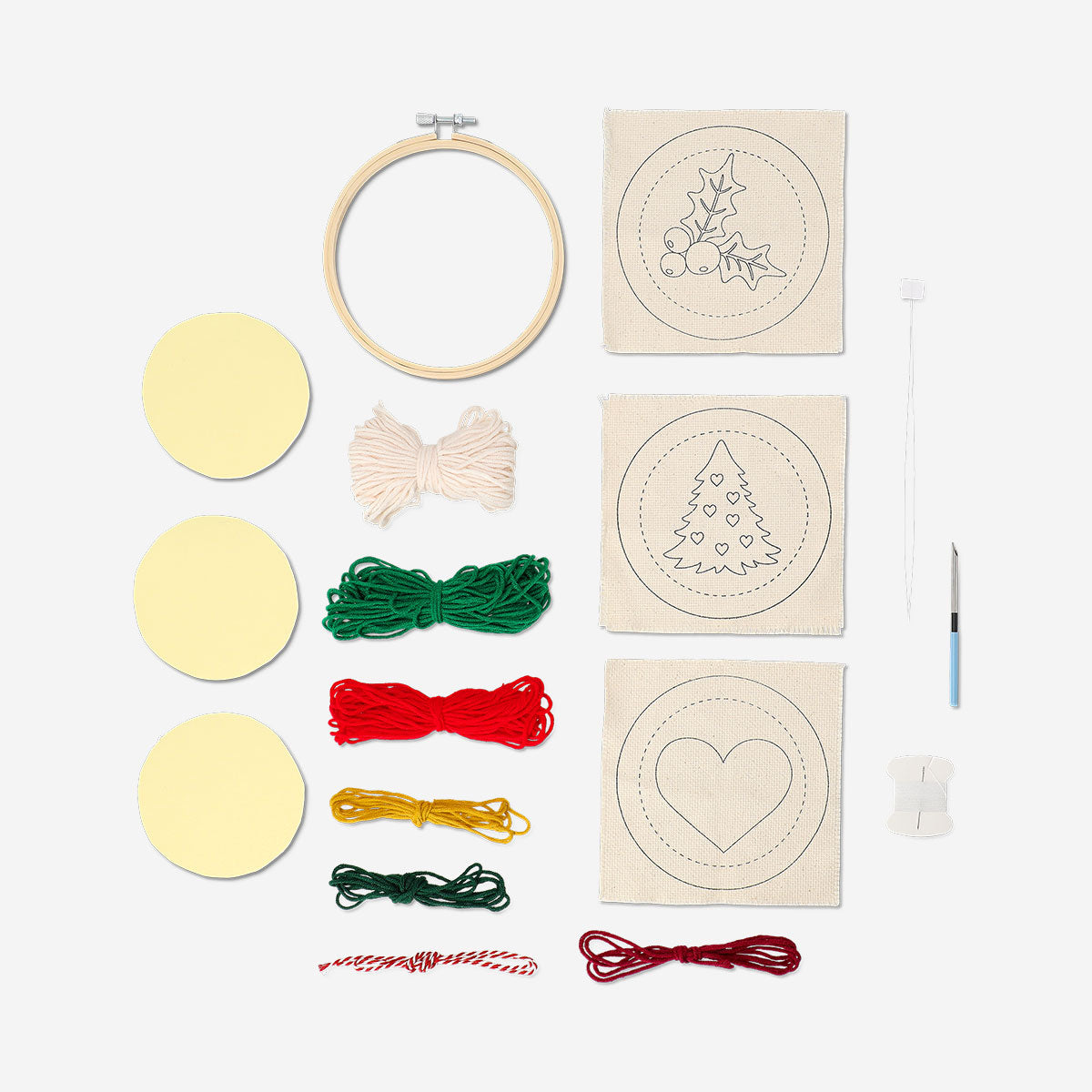 Flying Tiger Copenhagen Christmas punch needle set for hobby crafting, featuring festive designs and colorful embroidery supplies.