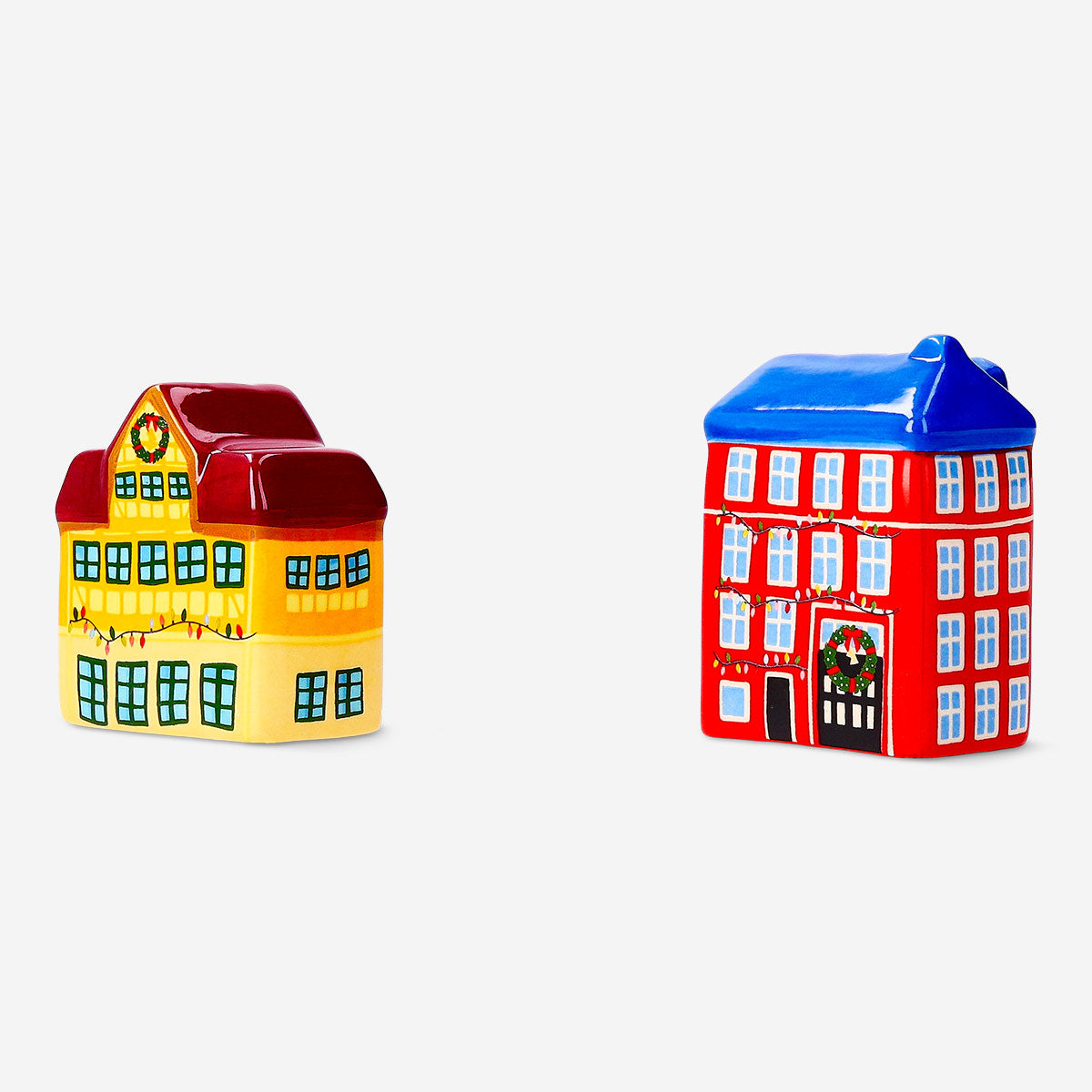 Salt and pepper house set by Flying Tiger Copenhagen, featuring two ceramic containers for kitchen seasoning.