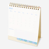 Monthly floral desk calendar 2027 by Flying Tiger Copenhagen, featuring colorful floral designs for office decor.