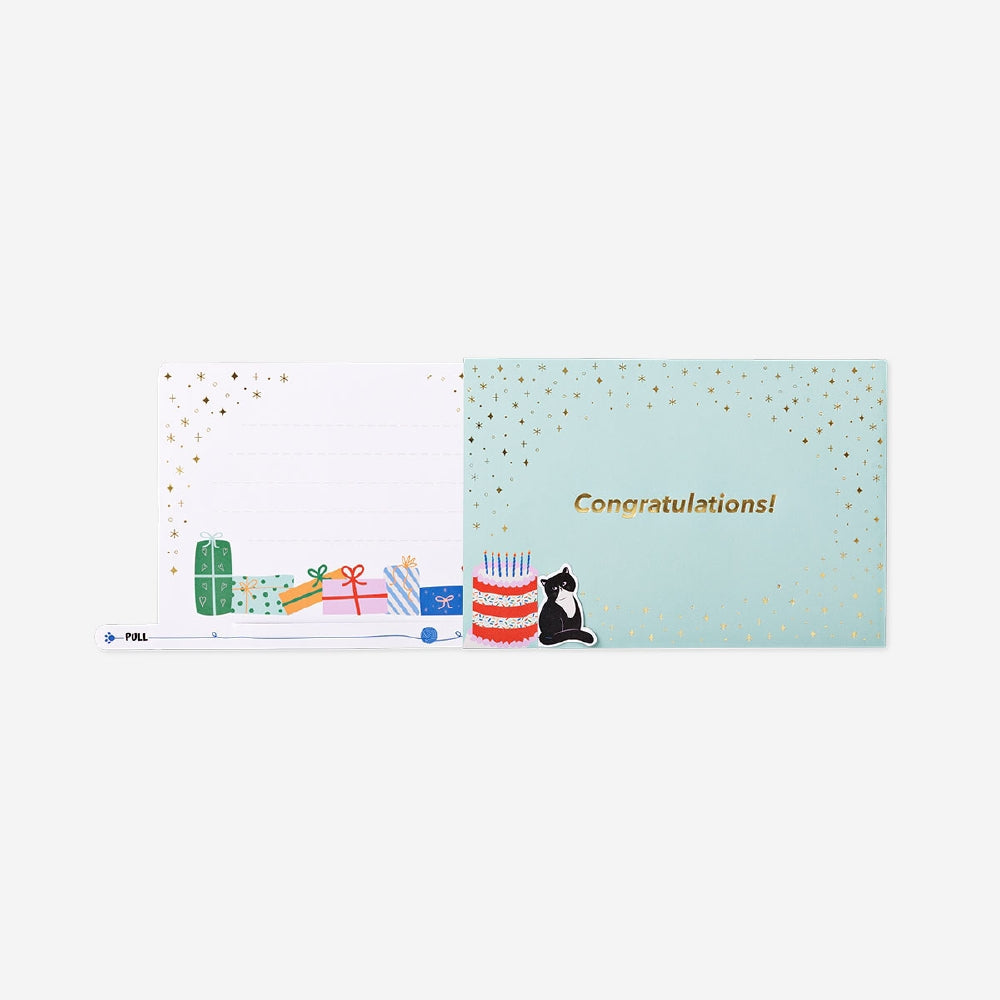 Office birthday card featuring a playful cat with presents and a pull-out feature, branded by Flying Tiger Copenhagen.