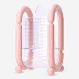 Pink Flying Tiger Copenhagen cosmetic organiser for makeup brushes, with multiple compartments for personal care storage.