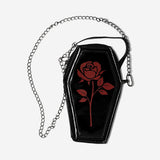Black coffin-shaped handbag made of textile by Flying Tiger Copenhagen, featuring a gothic-inspired design with a zip closure.