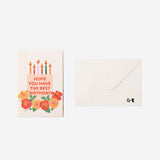 Fold-out birthday candles office greeting card by Flying Tiger Copenhagen featuring colorful, pop-up candle illustrations inside.