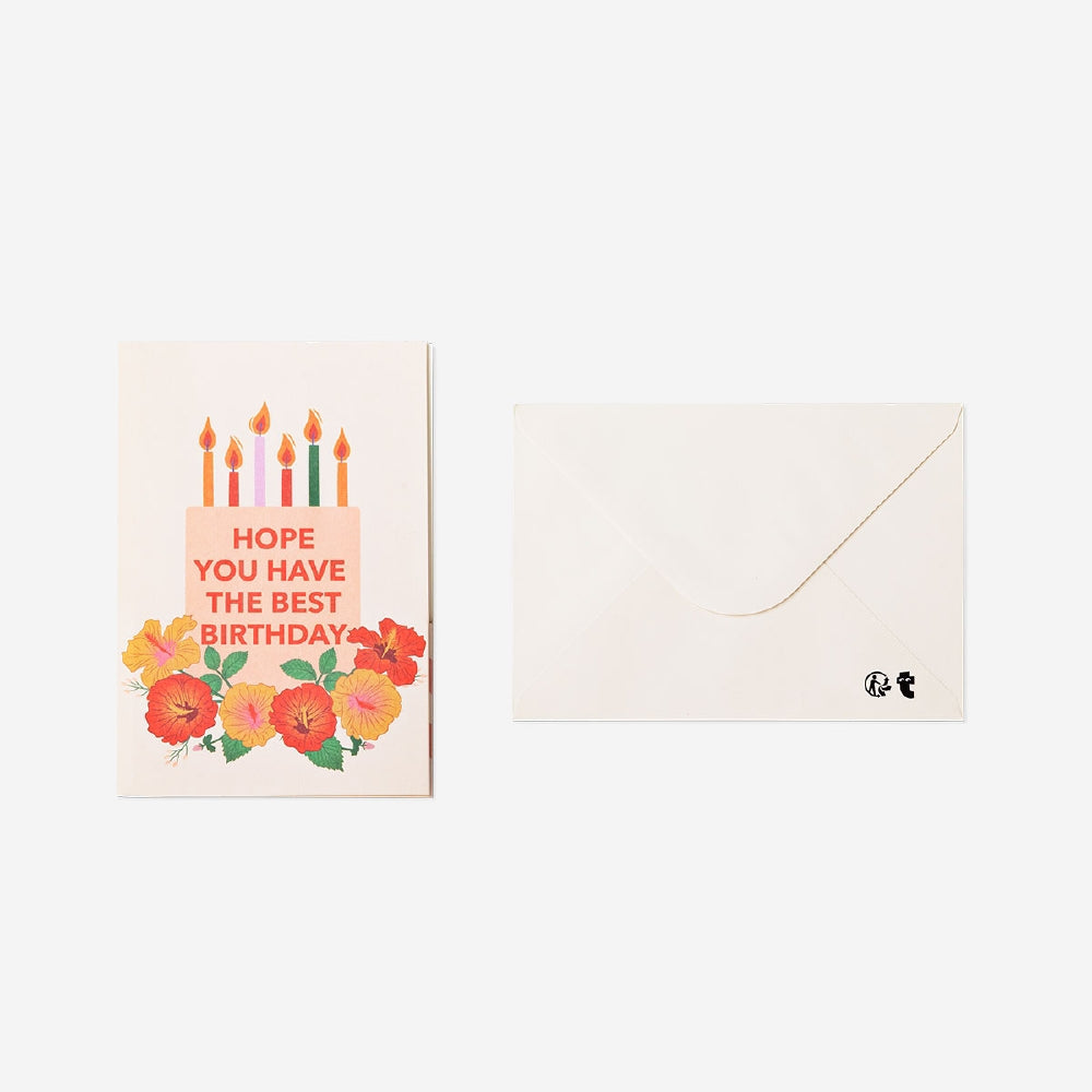 Fold-out birthday candles office greeting card by Flying Tiger Copenhagen featuring colorful, pop-up candle illustrations inside.