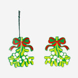 Four hanging paper mistletoes for party decorations, colorful and festive by Flying Tiger Copenhagen.