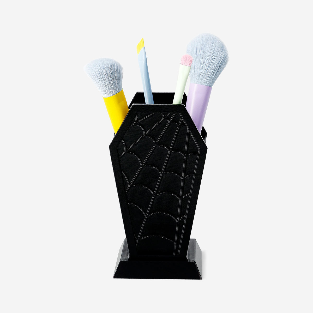 Flying Tiger Copenhagen coffin-shaped cosmetic organiser for personal care, with compartments for makeup and beauty items.