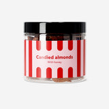 Golden almonds coated with cinnamon sugar, served in a bowl, showcasing a sweet and crunchy snack from Flying Tiger Copenhagen.