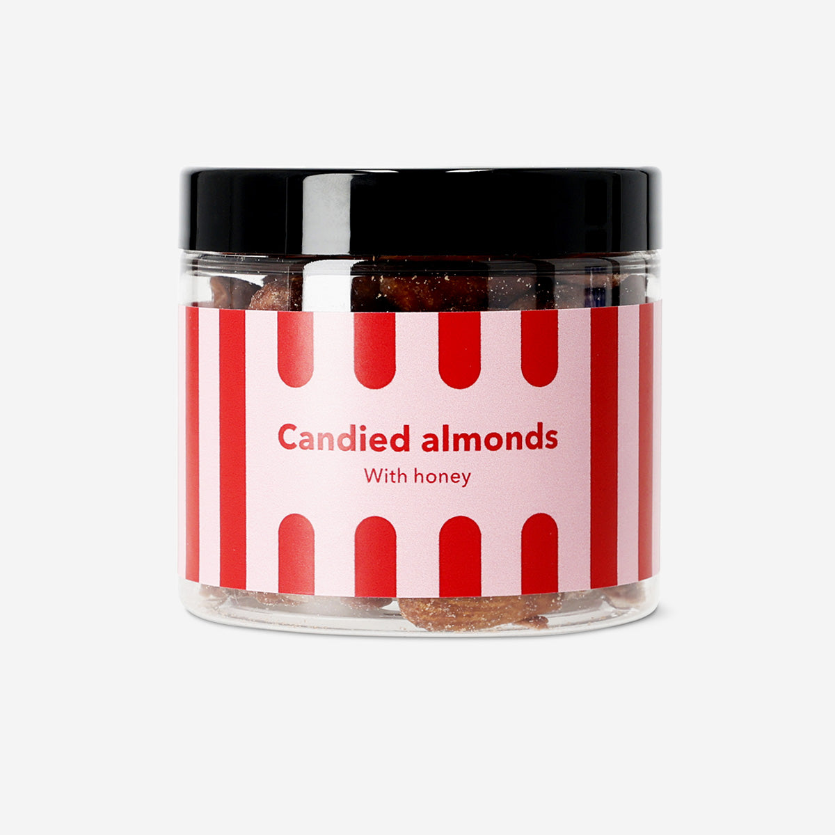 Golden almonds coated with cinnamon sugar, served in a bowl, showcasing a sweet and crunchy snack from Flying Tiger Copenhagen.