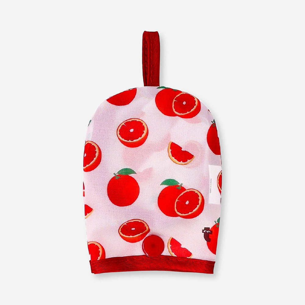 Foldable textile fan with blood orange print from Flying Tiger Copenhagen, shown open with vibrant orange and white design.