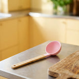 Flying Tiger Copenhagen Designer Collection 27 cm ladle for kitchen use, featuring a sleek handle and durable stainless steel bowl.