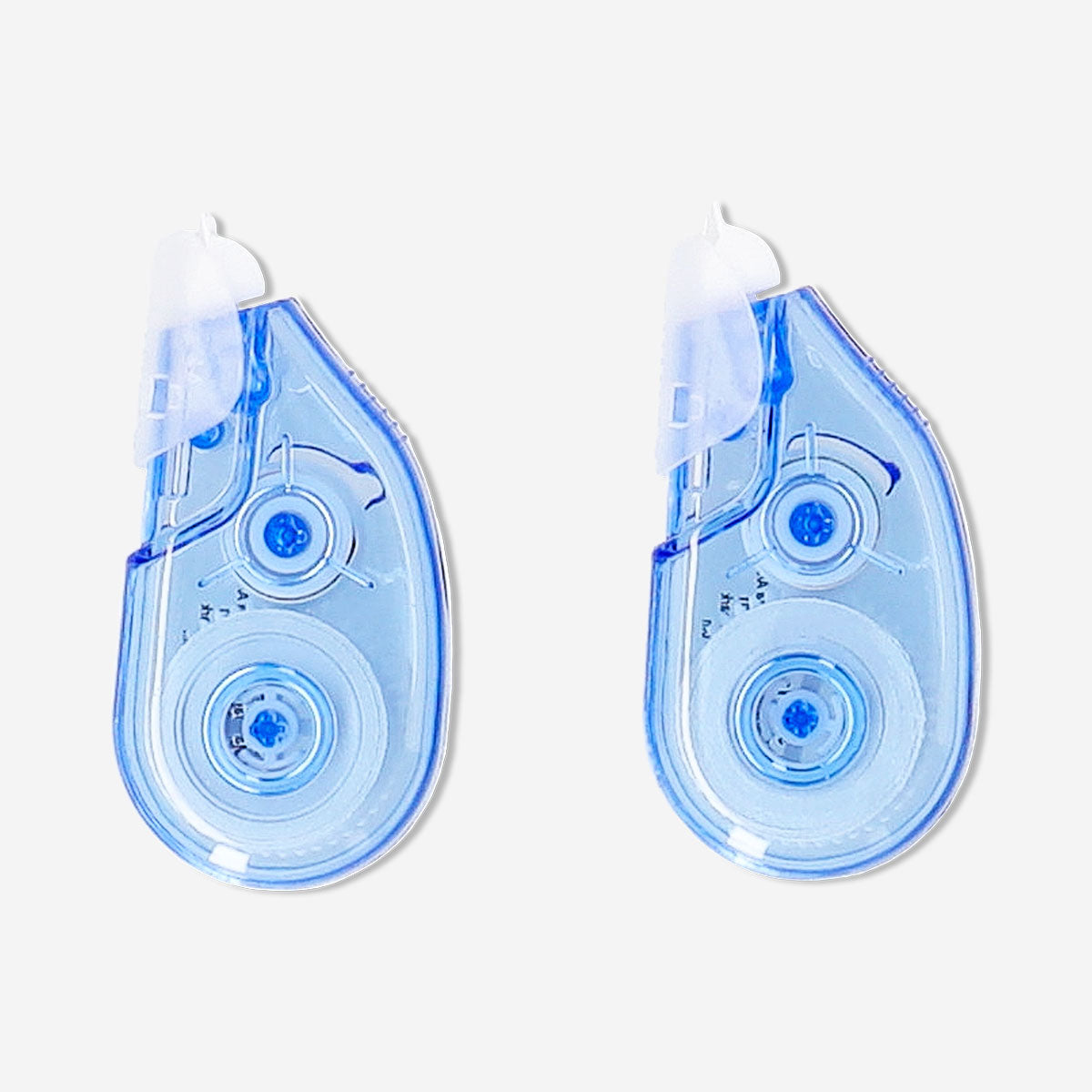 Two Flying Tiger Copenhagen correction tape dispensers for office use, compact and easy to apply for quick mistake correction.