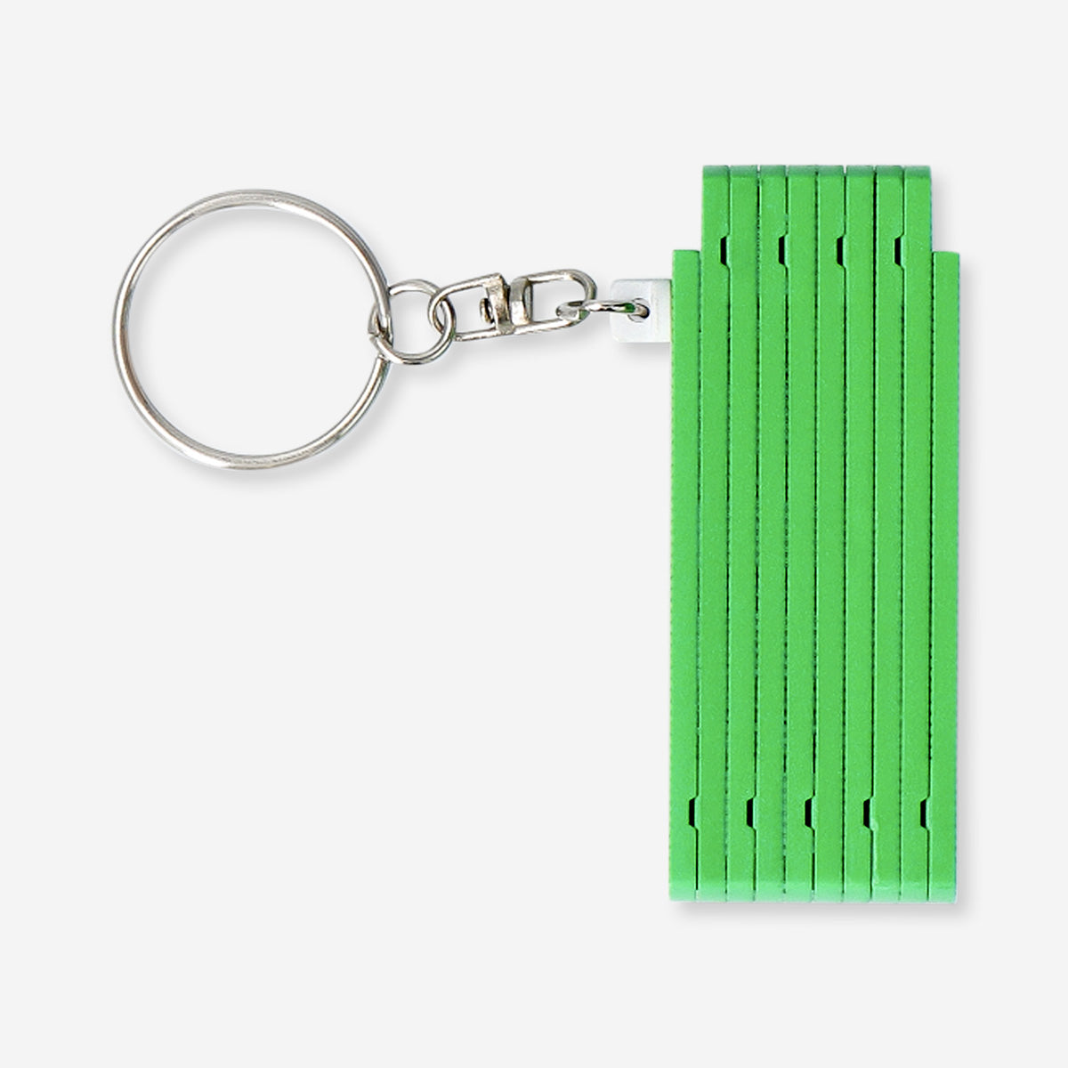 Mini folding green ruler key ring by Flying Tiger Copenhagen, compact gadget with a foldable measuring tool attached to a key ring.