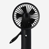Black Mist Spray Fan gadget by Flying Tiger Copenhagen showing a compact handheld fan with mist spray function.