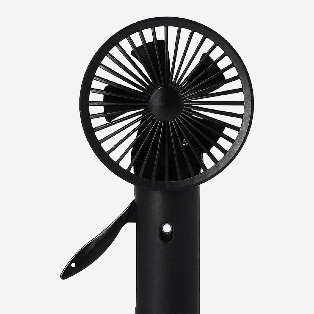 Black Mist Spray Fan gadget by Flying Tiger Copenhagen showing a compact handheld fan with mist spray function.