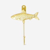 Gold fish wall hook in home decor, featuring a whimsical fish design by Flying Tiger Copenhagen for wall mounting.