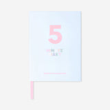 Flying Tiger Copenhagen five-minute diary for office use, featuring a compact design with a colorful cover and daily planning pages.