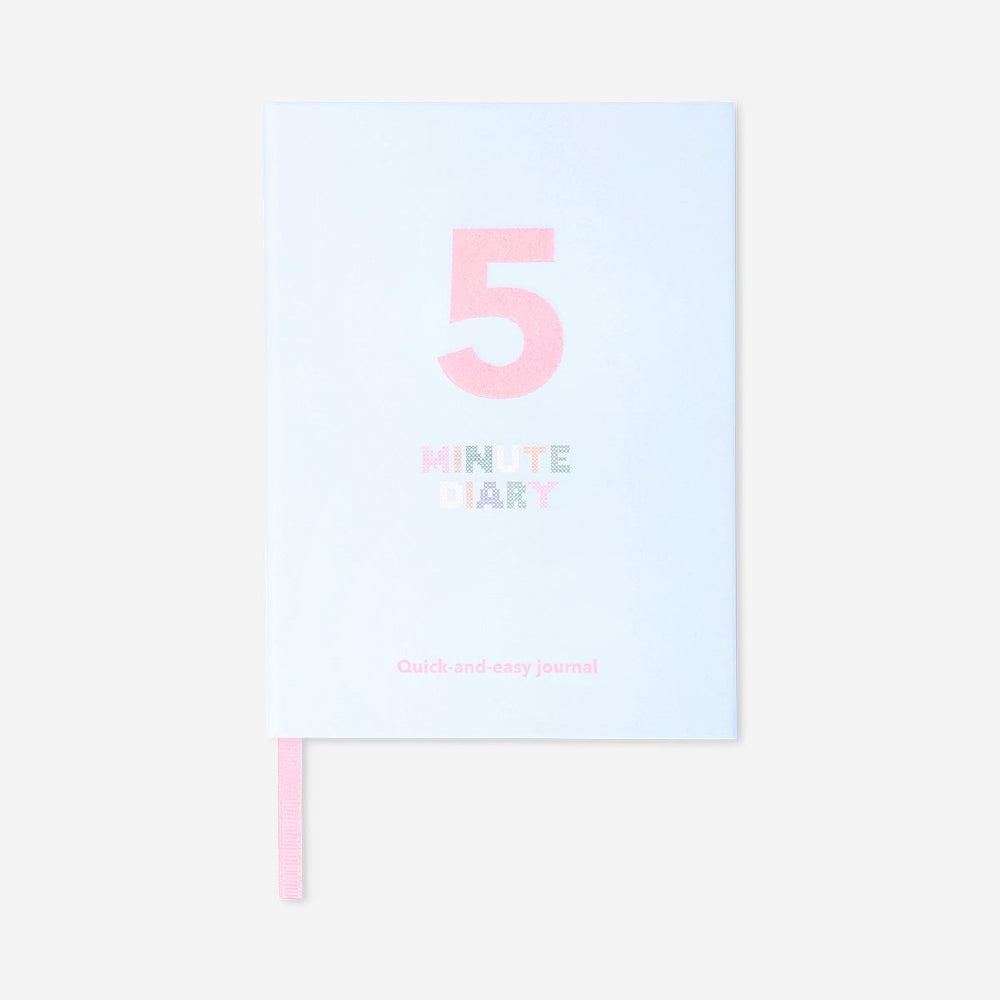 Flying Tiger Copenhagen five-minute diary for office use, featuring a compact design with a colorful cover and daily planning pages.