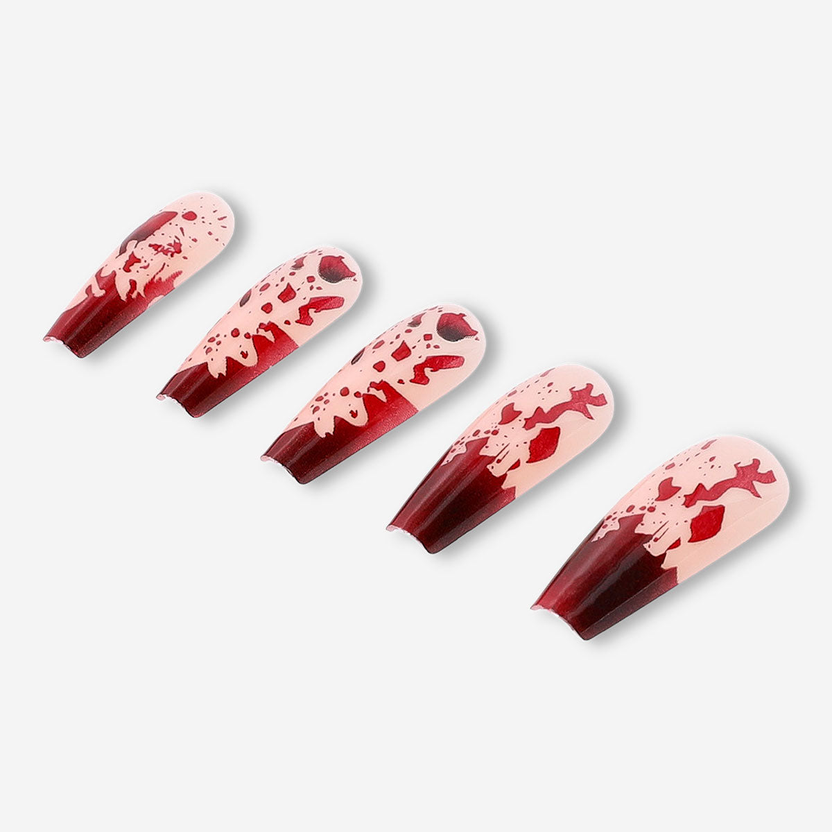 Flying Tiger Copenhagen press-on nails with a blood splatter design, featuring bold red and black nail art for a striking look.