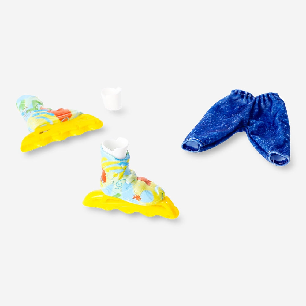 Colorful Flying Tiger Copenhagen finger inline skates toy for kids, with adjustable straps and small wheels for pretend skating fun.