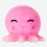 Pink octopus Press Me toy gadget from Flying Tiger Copenhagen, soft silicone with squishy, tactile tentacles for sensory fun.