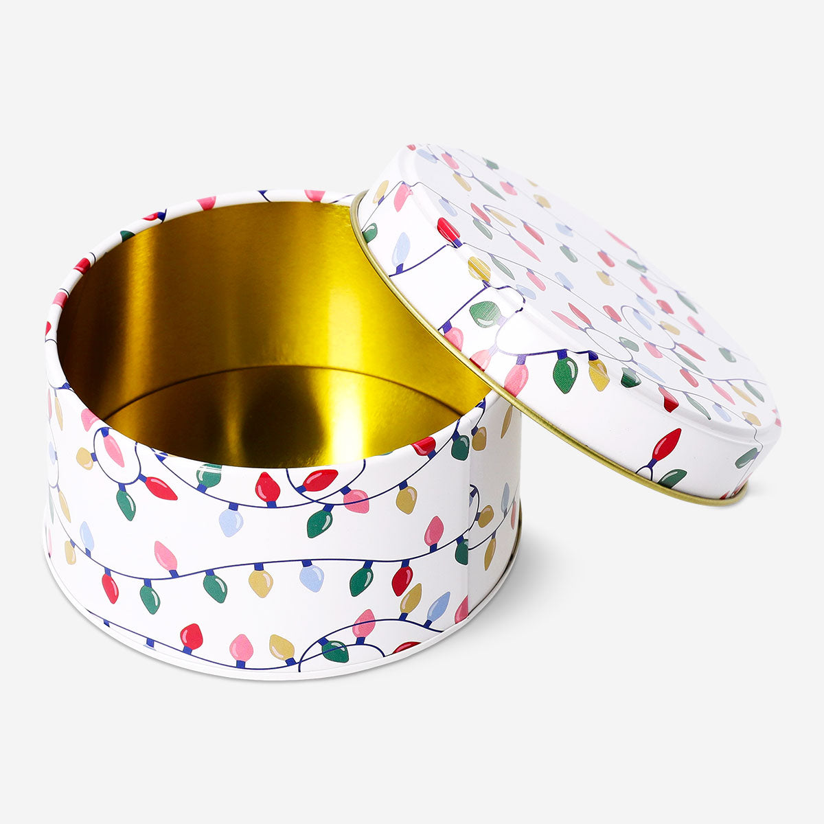 Tall round Flying Tiger Copenhagen cake tin with Christmas string lights print, ideal for baking and festive storage.