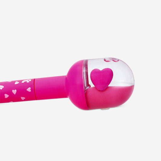 Ballpoint pen with pink heart topper