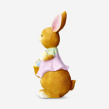 Decorative Easter rabbit holding a basket - 21 cm