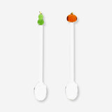 Set of two glass kitchen spoons with decorative pumpkin toppers, ideal for cooking and serving Halloween-themed dishes.