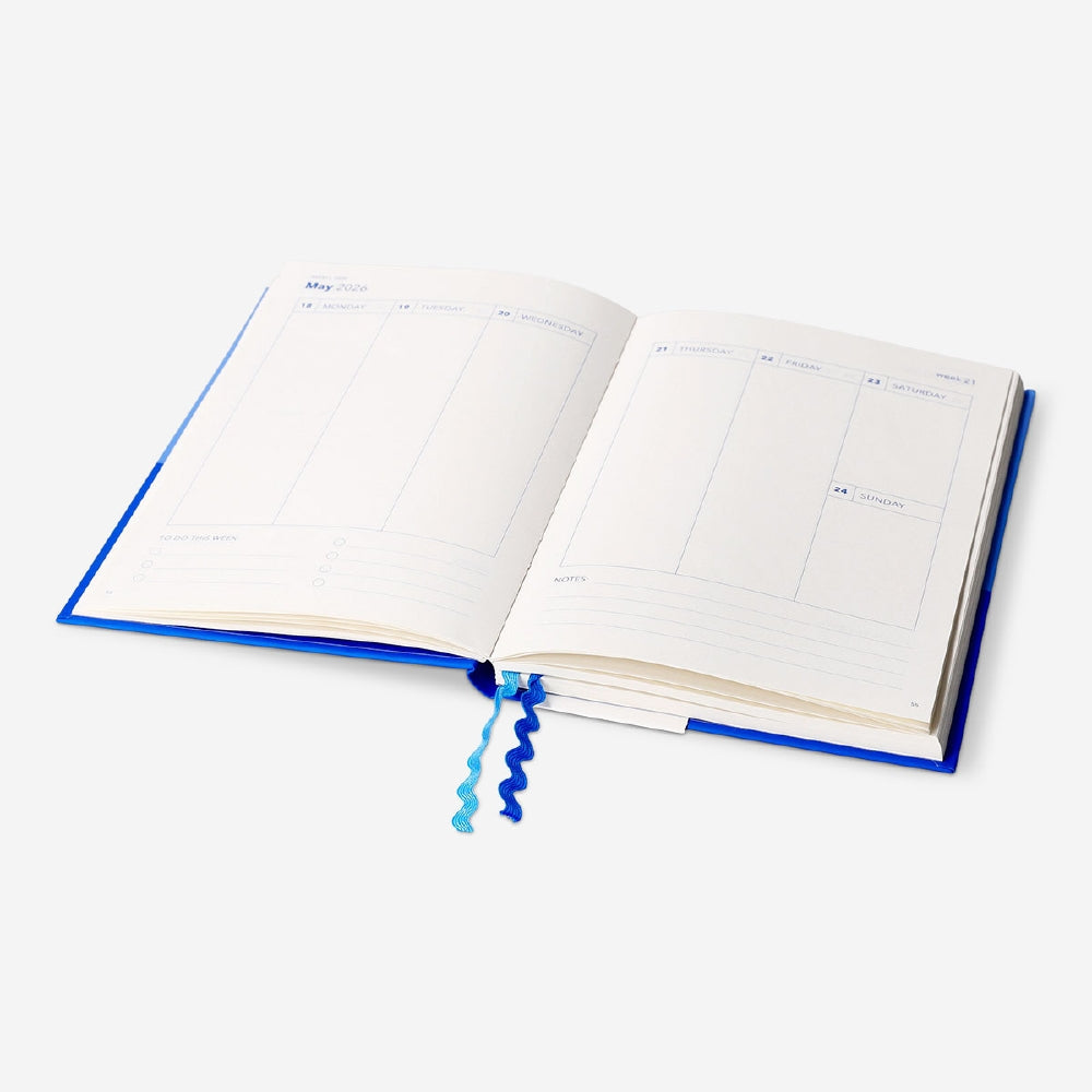 Blue Flying Tiger Copenhagen study planner for 2026-2027, office organizer with calendar and note pages.
