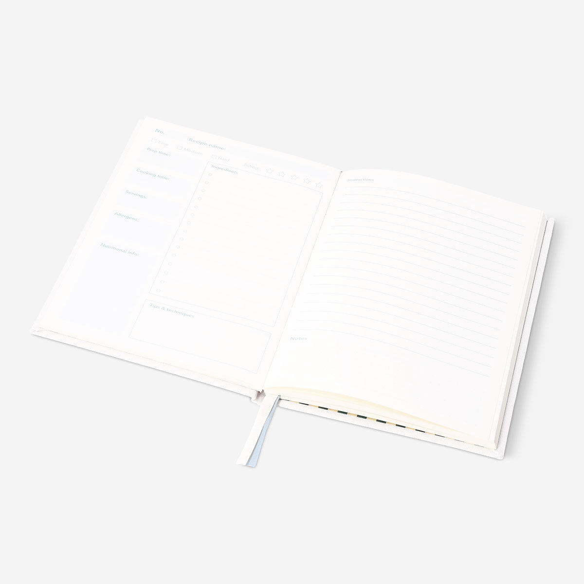 Flying Tiger Copenhagen office recipe book with colorful pages and creative culinary ideas inside.