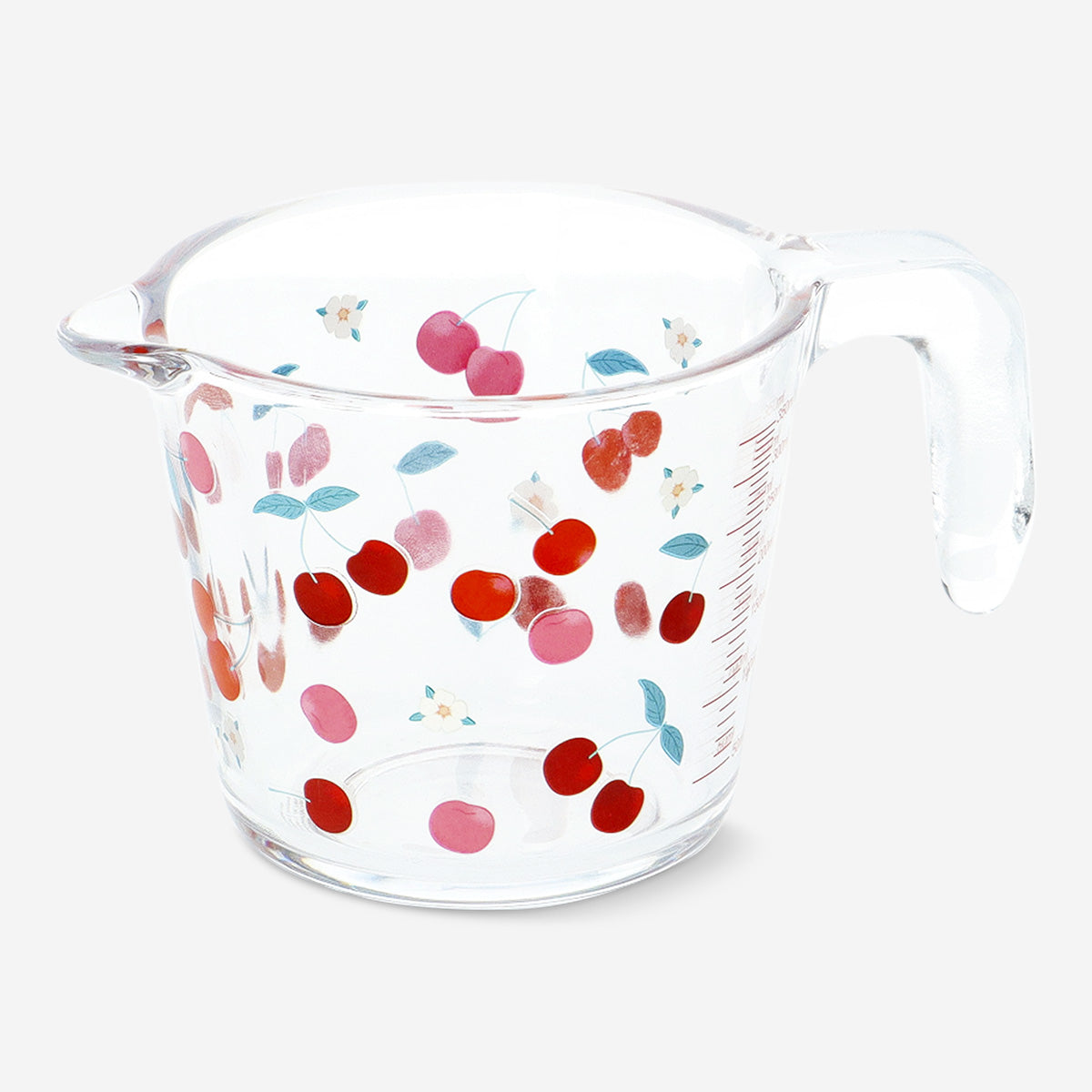 Flying Tiger Copenhagen cherry print measuring cup for kitchen use, featuring clear measurements and a colorful cherry design.