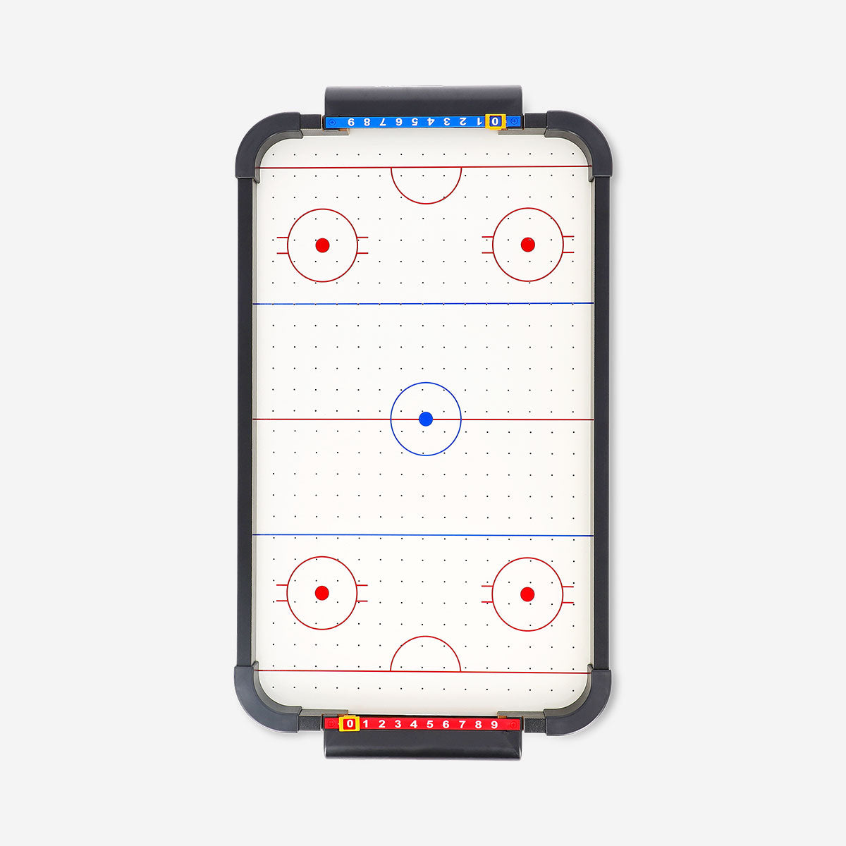 Flying Tiger Copenhagen classic air hockey game with puck and paddles on a smooth playing surface.