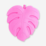 Pink leaf-shaped ice block for home use, designed by Flying Tiger Copenhagen, displayed on a clear surface.