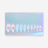 Flying Tiger Copenhagen press-on nails featuring colorful hearts and rainbows for a fun, stylish personal care accessory.