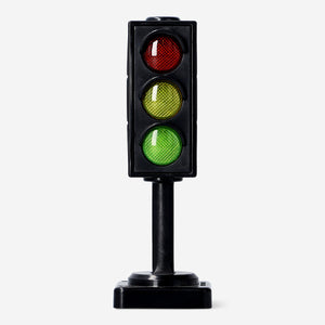 Toy traffic light from Flying Tiger Copenhagen with red, yellow, and green lights for imaginative play.