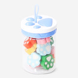 Set of colorful paw erasers from Flying Tiger Copenhagen, designed for office use, featuring playful animal paw shapes.