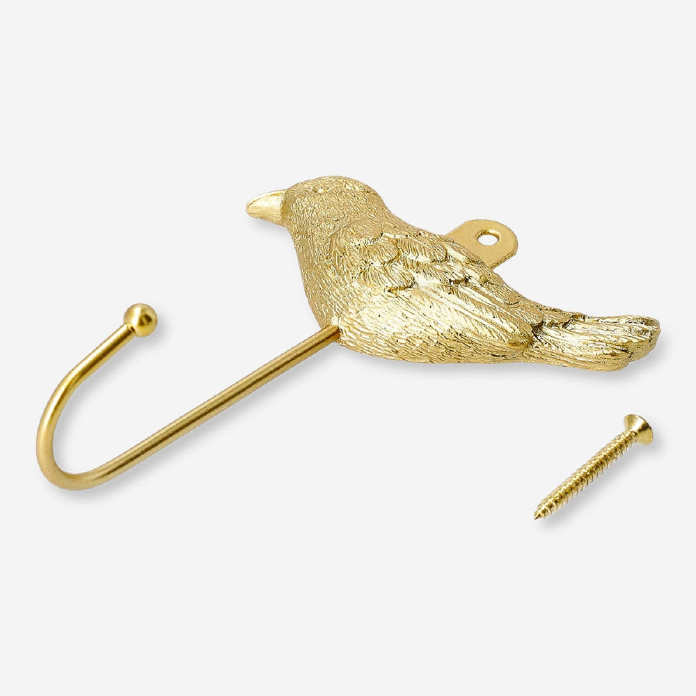 Gold bird hook for home decor by Flying Tiger Copenhagen, featuring a sleek bird-shaped design for wall hanging.